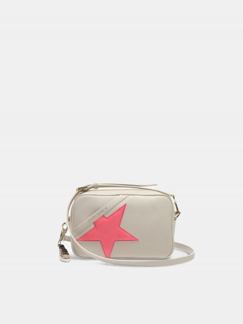 Star Bag made of pebbled leather with neon pink star
