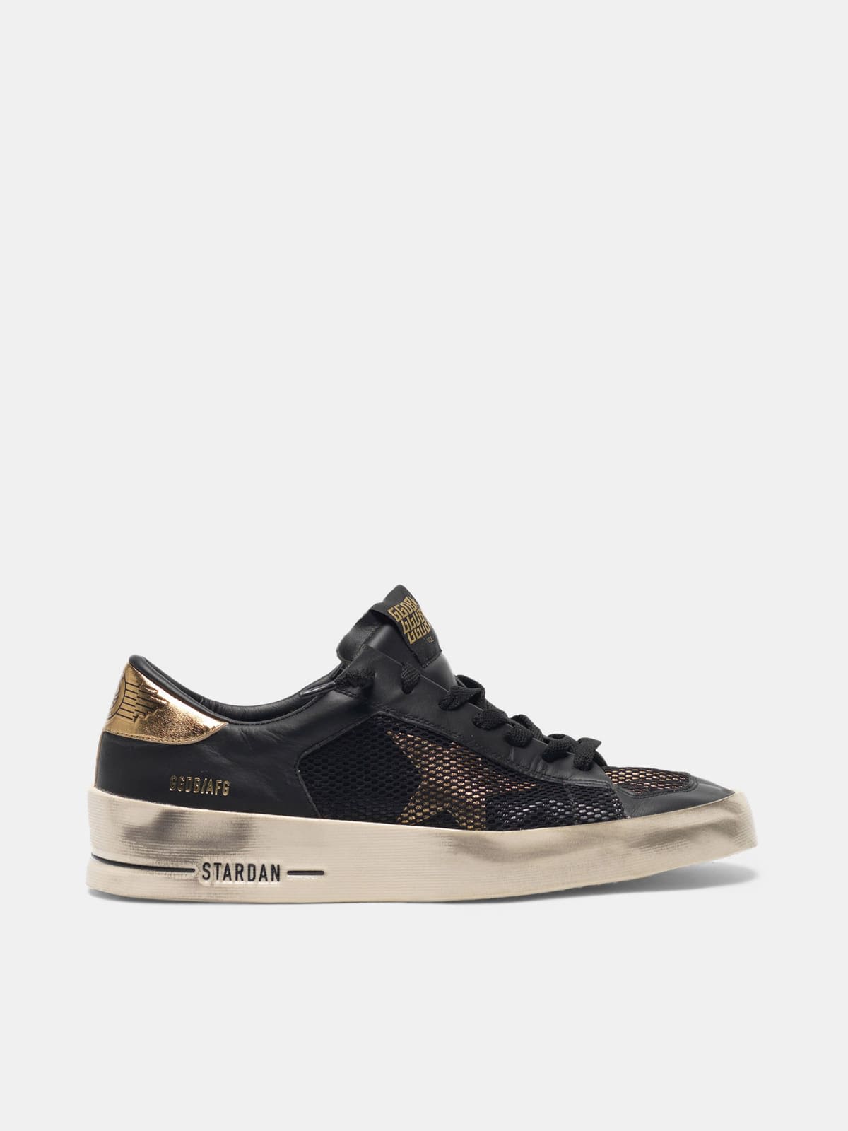 Stardan sneakers in black and gold leather with mesh inserts